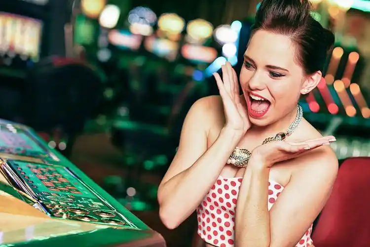 Filipino player celebrating a big win on a mobile casino game